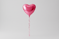 Einzelner rosa Herzballon